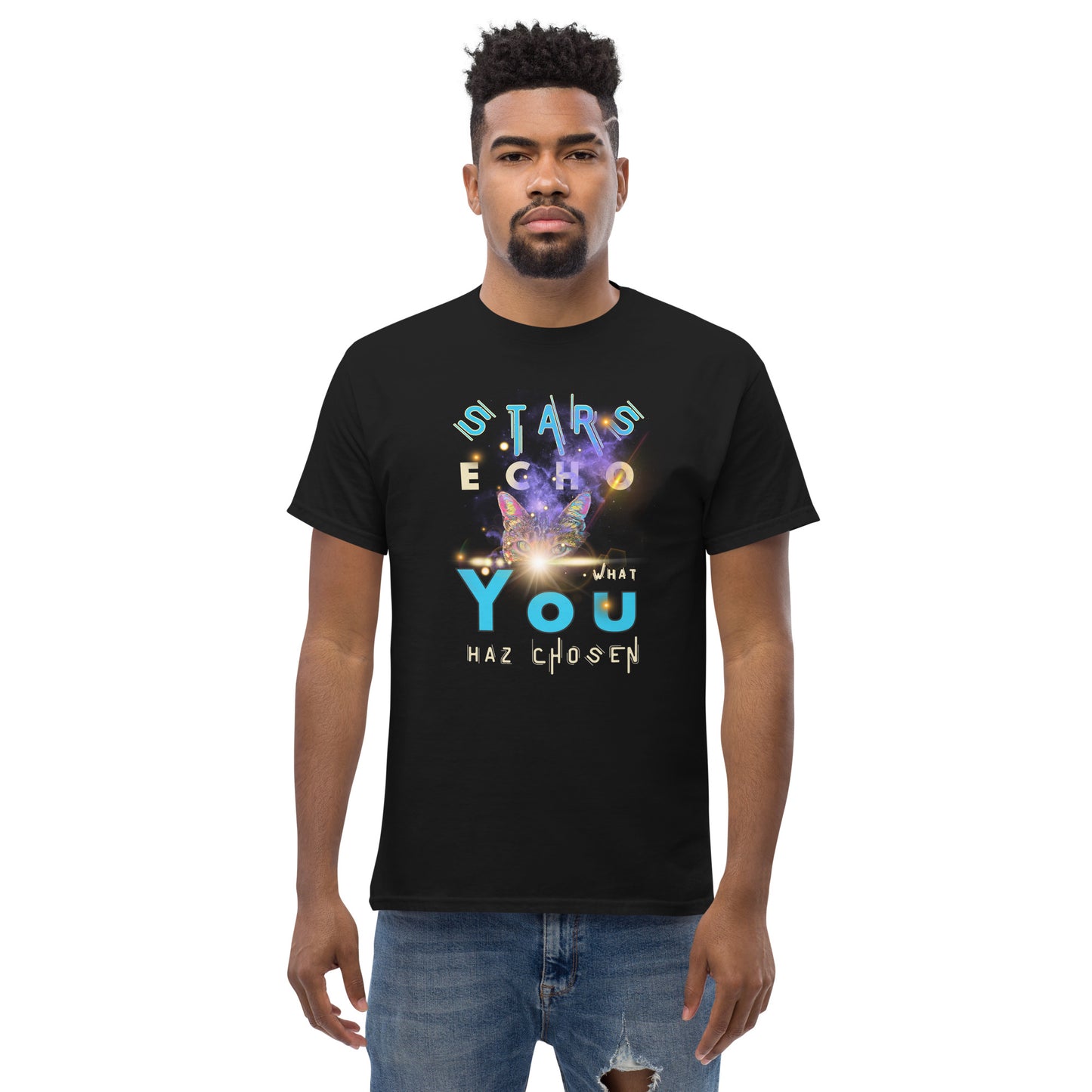Man wearing a black t-shirt with colorful text and graphics on a white background