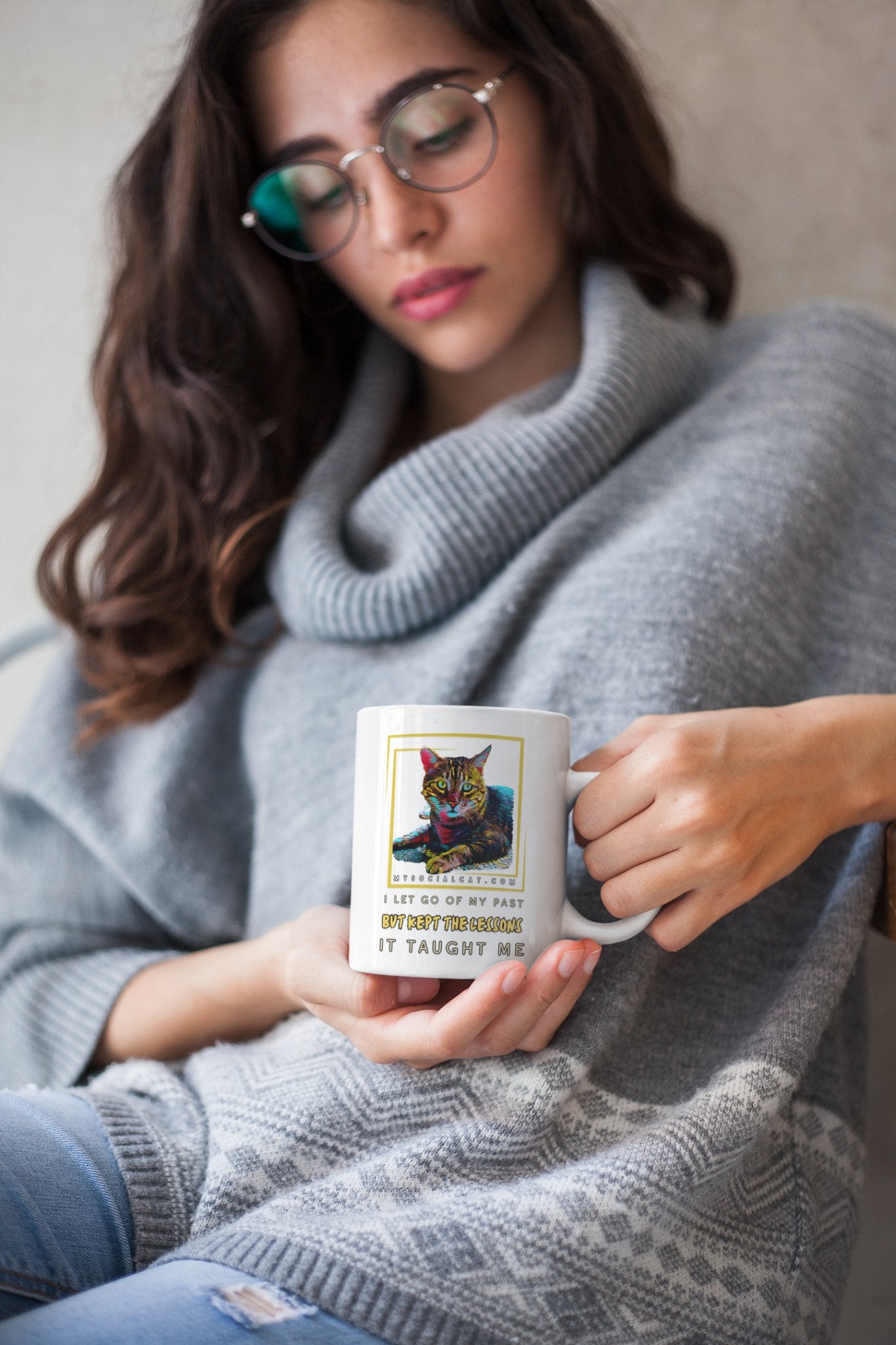 mockup-of-a-girl-wearing-a-winter-sweater-holding-a-coffee-mug-22431_1-499671 mysocialcat.com
