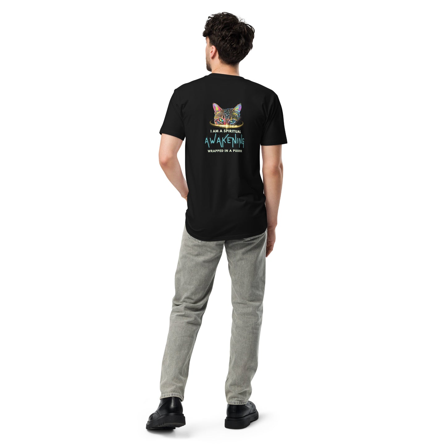 Person wearing a black t-shirt with a colorful graphic and text on the back, standing against a white background.