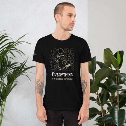 young white male with arm tattoos wearing black tshirt in studio 