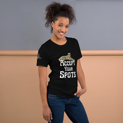 young black woman wearing black tshirt and jeans smiling inside the building says accept your spots