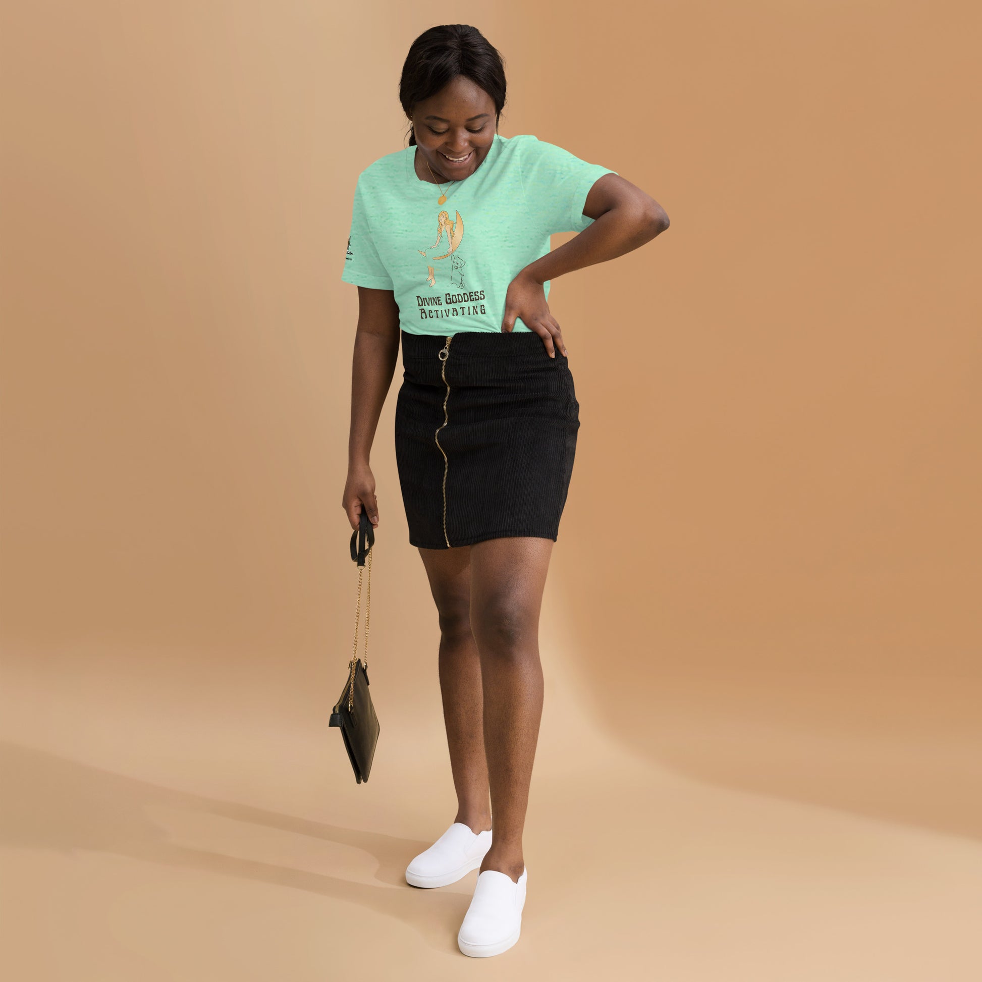 young black woman in studio wearing heather mint tee and black skirt