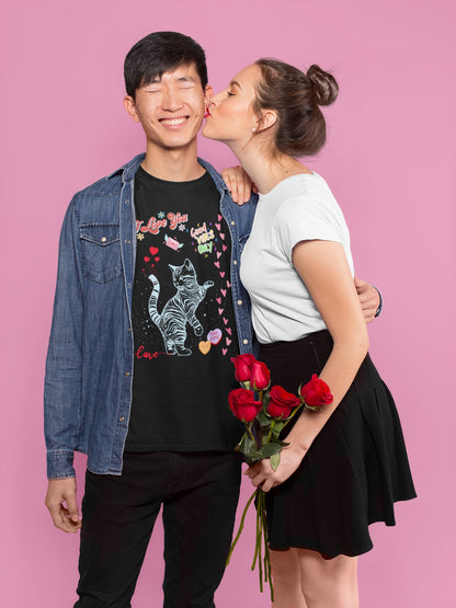 young couple woman kissing his cheek wearing black tshirt i love you good vibes cat hearts on pink background