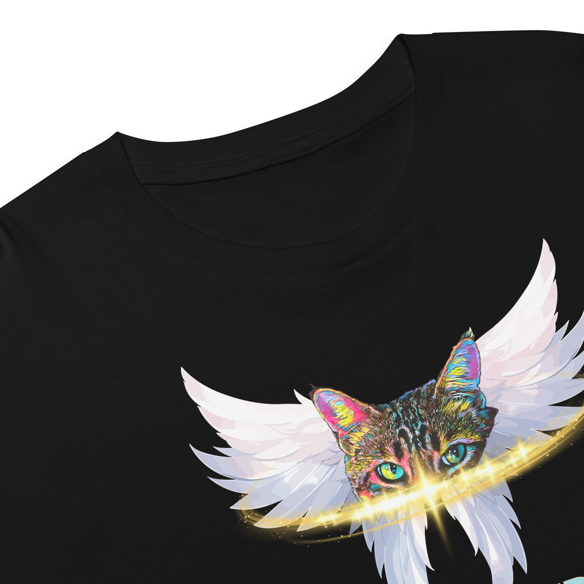 A close-up of a black t-shirt featuring a colorful graphic of a cat with white angel wings and a glowing gold ring around its eyes.