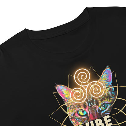 Close-up of a black short-sleeve T-shirt with a colorful graphic of a cat's face and glowing spiral symbols on the chest.
