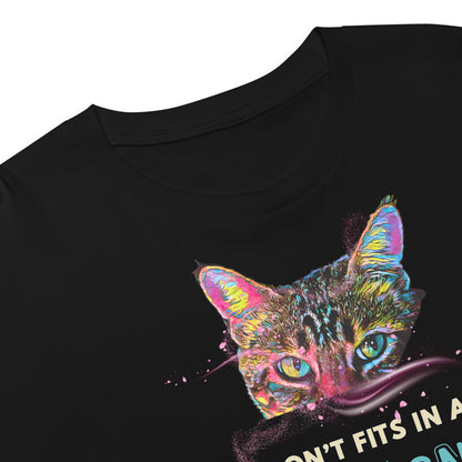 Close-up of a black short-sleeve T-shirt with a colorful graphic of a cat's face and partial text on the front, shown against a white background.