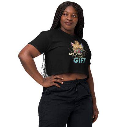 Person wearing a black t-shirt with colorful text and graphics on a white background